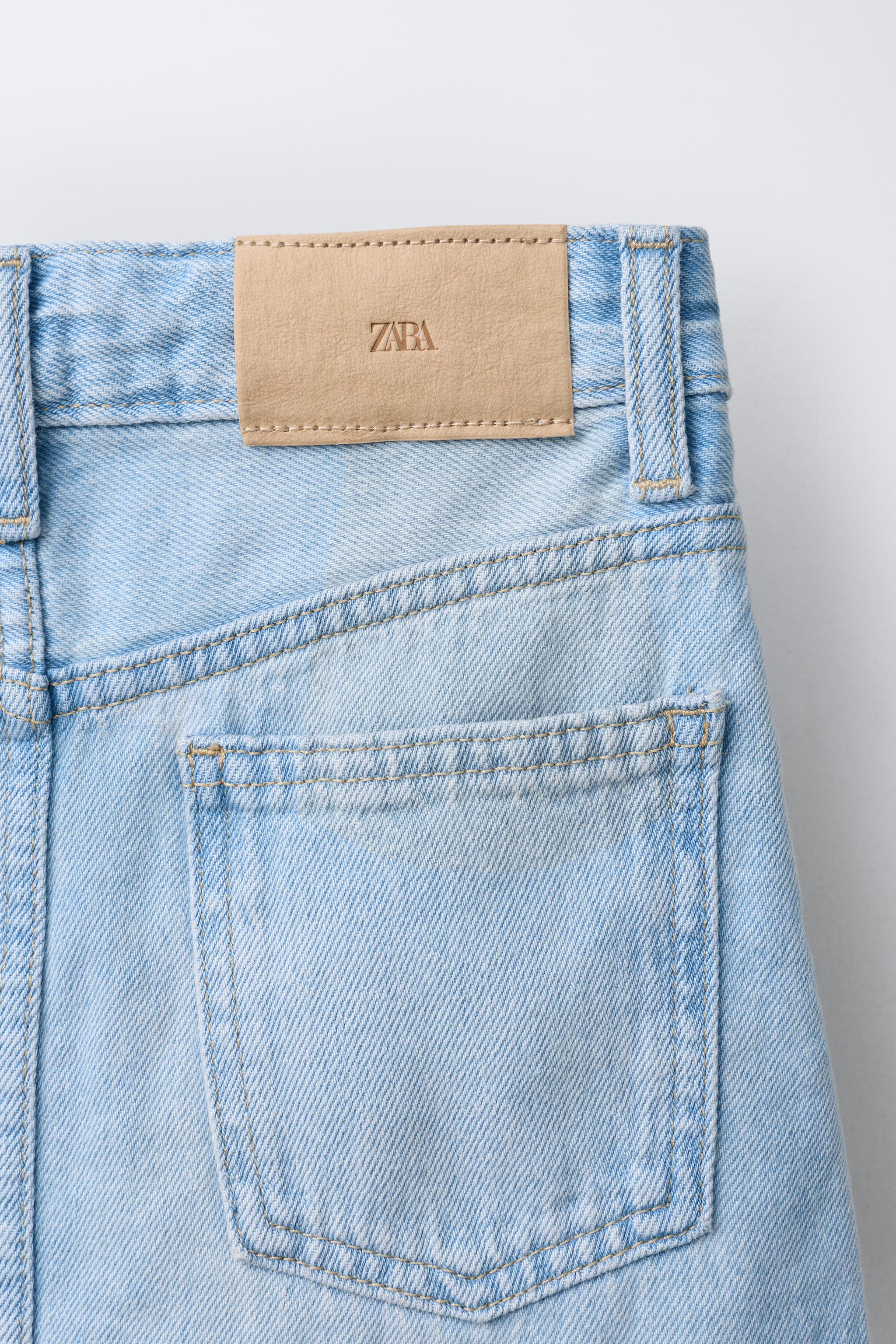 JUPE EN JEAN MI-LONGUE À BOUTONS